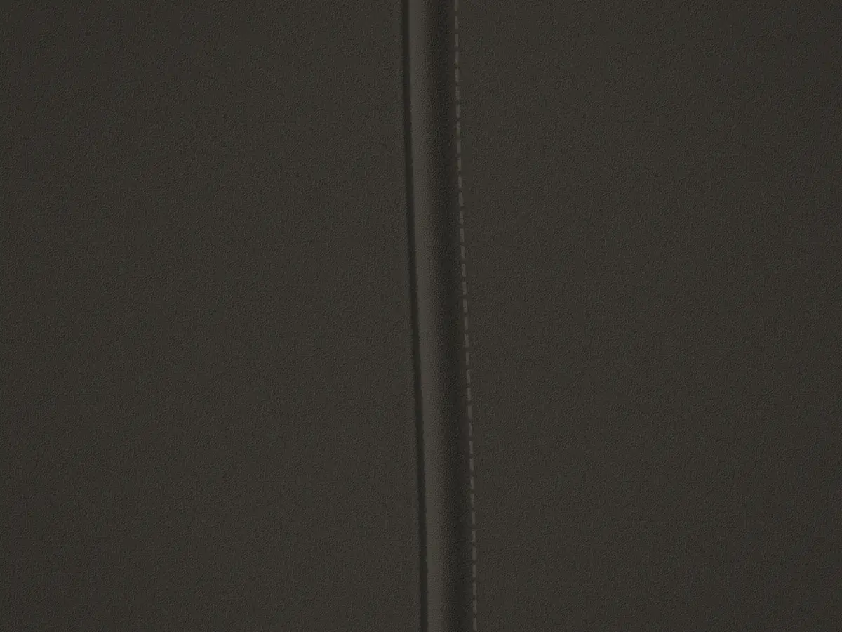 Drawn close-up of a finished French seam on black crepe, with its line of black stitches.